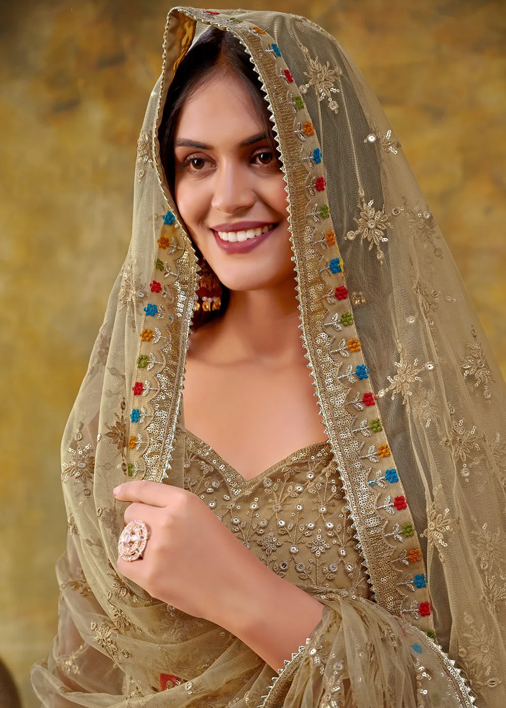 Chickoo Beige Premium Net Sequins Wedding Lehenga Choli